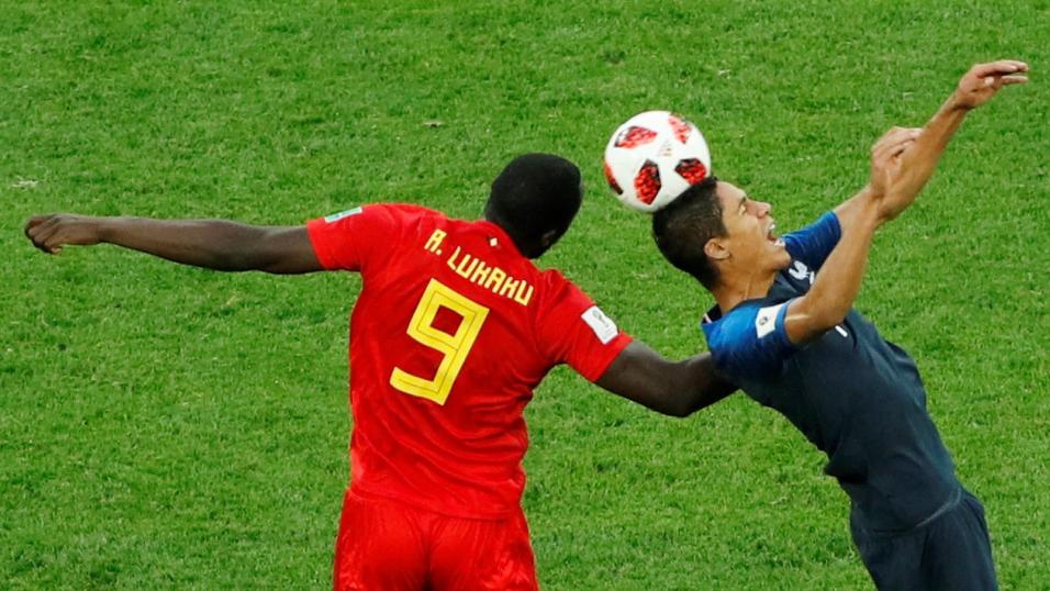 Romelu Lukaku challenged Raphael Varane